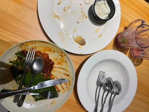 Table Shows Clear Evidence Of Completed Meals Stock Photos