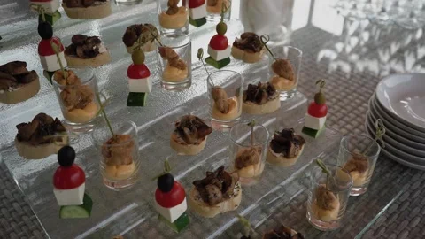 Table with snacks, buffet table for guests Video stock 306173376