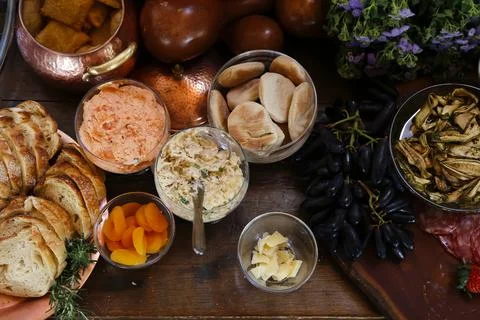 Table with snacks - party buffet with various savory foods Stock Photos