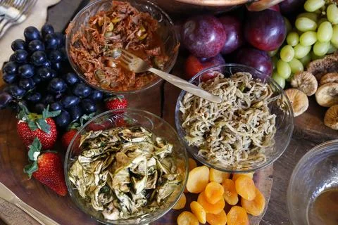 Table with snacks - party buffet with various savory foods Stock Photos