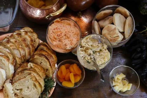 Table with snacks - party buffet with various savory foods Stock Photos