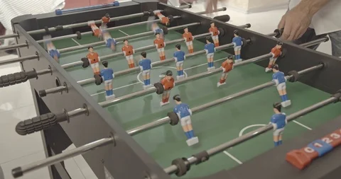 Table soccer. Invisible playing table football. Unknown playing foosball. The Stock Footage 103160226