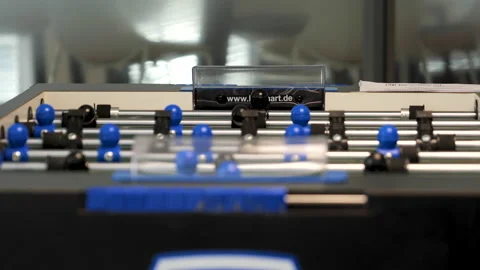 Table Soccer in slow motion - kicker Stock Footage 143897362