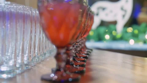 Table with soft drinks in glasses and empty glasses at a concert, party Stock Footage 151266048