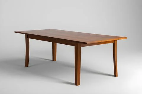 The table stands in the middle of a white room on a light white background. Stock Illustration