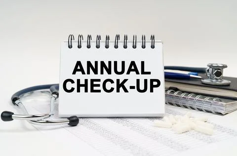 On the table is a stethoscope, a diary and a notebook with the inscription -  Stock Photos