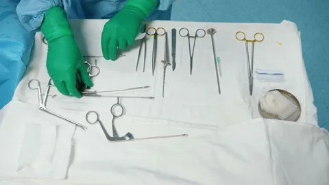 Table with surgical instruments. Scalpel, scissors. Resuscitation Stock Footage 150773628