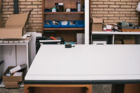 Table with a tape measure on it in a workshop Stock Photos