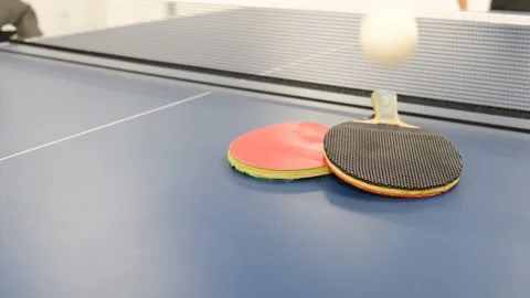Table tennis and two rackets. Background for the text in the frame. The concept Stock Footage 222638607