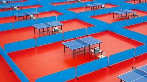 Table tennis arena.Tracking view of ping pong tables ready to play. Table layout Stock Footage 133462954