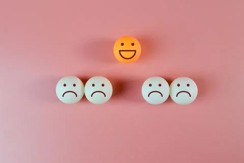 Table tennis ball with facial expression of feedback. Customer evaluation and Stock Photos