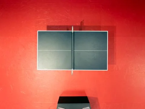Table tennis black table with red floor from above. Indoor sports. Ping Pon.. Stock-Fotos