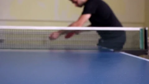 Table tennis player serving, closeup - small depth of field, focus at the ball! Stock Footage