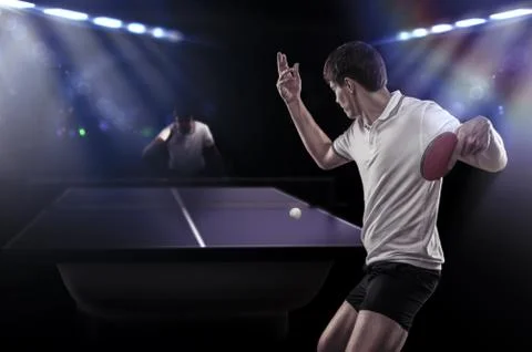 Table tennis player serving Stock Photos