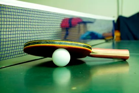 Table Tennis Racket with White Ball Stock Photos