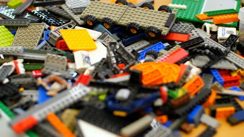 On the table there are scattered a lot of details from the children's designer Stock Footage 89243517