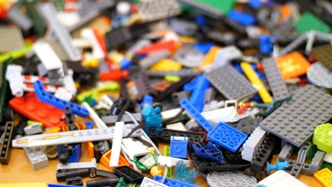 On the table there are scattered a lot of details from the children's designer Stock Footage 89243629