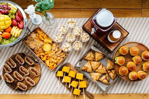 On the table, there is an impressive array of various types of food items, .. Foto stock