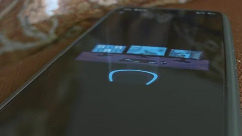 Table with three computer monitors themed graphic presentation Stock Footage 303426136