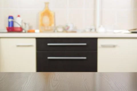 Table top and blur kitchen Interior of background Stock Photos