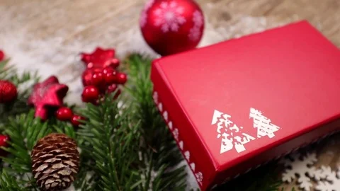 Table top background video with Christmas ornaments and gift box Video stock 82702770