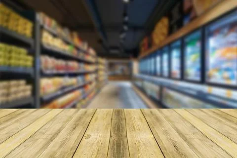 Table top counter with Blur Shelf display interior of Retail shop background Stock Photos