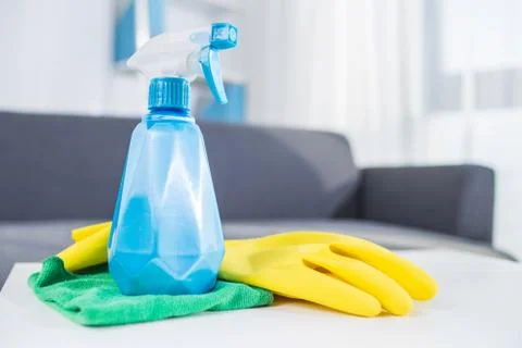 Table top house cleaning products : spray, glove Stock Photos