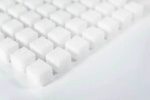 Table top shot Group of Sugar cubes vary position on White Stock Photos