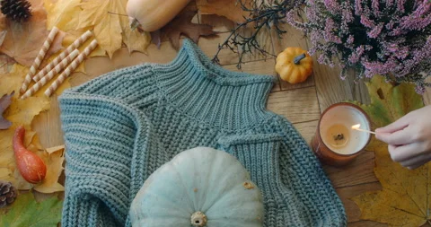 Table top video of fire up the candle in the autumn decoration composition with Stock Footage 164552209