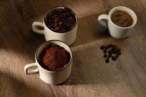 Table Top View of Coffee Beans and Cup Stock Photos