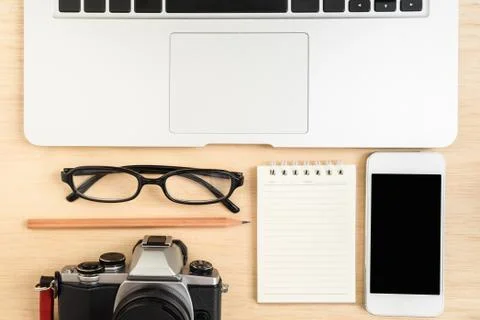 Table top view with laptop camera and phone Foto stock