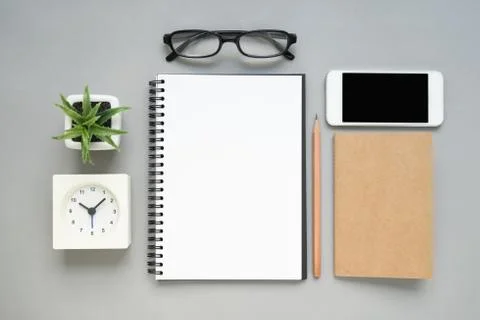 Table top view of office desk with stationery items Stock Photos
