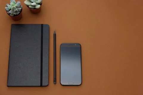 Table top view, office mock up, template with notebook and smartphone with co Stock-Fotos