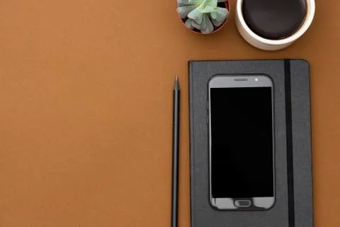 Table top view, office mock up, template with notebook, coffee cup, succulent Stock-Fotos