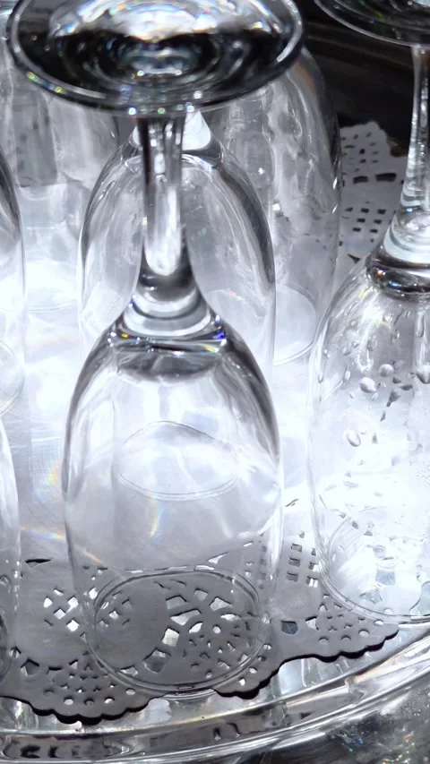 A table with a tray of glasses on bar counter. Stock-Footage 314181692