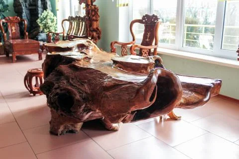 A table from a tree trunk. Stock Photos