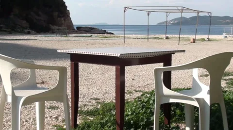 Table for two at the beach zoom in Stock Footage 35741633