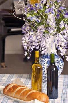 Table With Two Bottles Of Wine Stock Photos