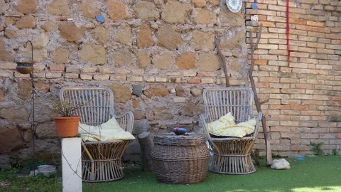 Table for two near ancient wall Video stock 103351957