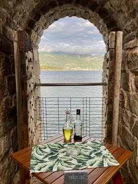 Table for two reserved for a romantic dinner with a view of the Adriatic Se.. Stock Photos