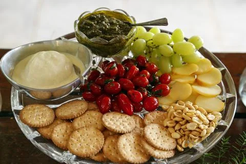 Table with various snacks - party buffet with various savory foods Stock Photos