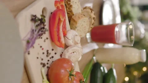 On table vertical shot of mushrooms pepper tomato on wooden board. Fresh kitchen Stock Footage 144960775