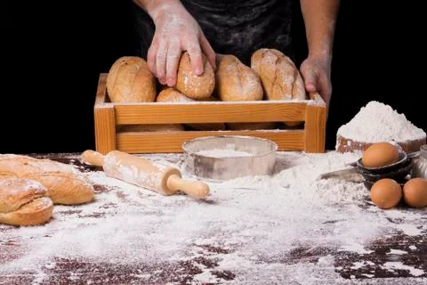 The table was full of bread flour And equipment for making bread And the chef Stock Photos