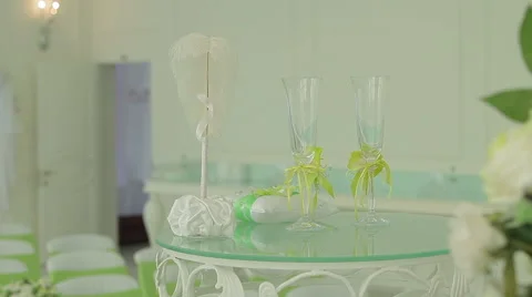 Table with wedding accessories and two glasses Stock Footage 45151758