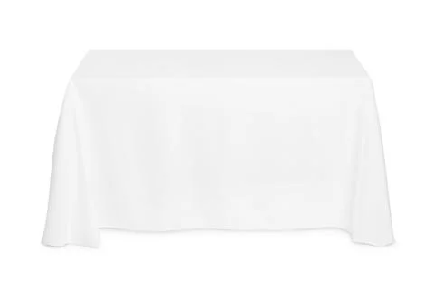 Table with white tablecloth isolated on white Stock Photos
