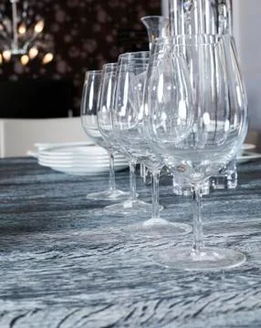 Table with wine glasses Stock Photos