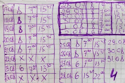 Table with work schedule written by hand in a notebook, work time table Stock Photos