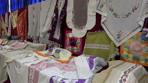 Tablecloth needlework fabrics on the exhibition Stock Footage 196963498