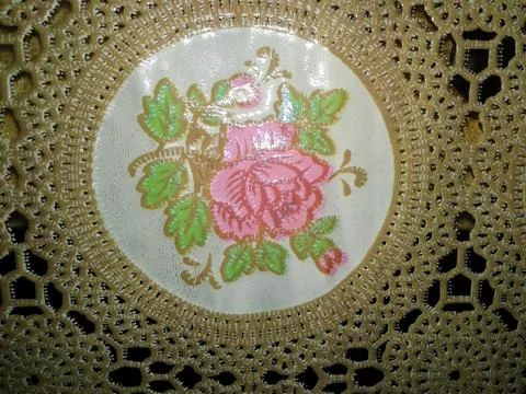 Tablecloth with a rose Stock Photos