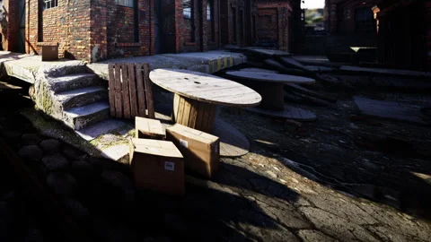 Tables and boxes near a brick building in an empty area Stock Footage 345058035